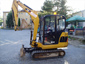 Pásový-bagr-CAT-302-(2,8-t.)-kladivo,-svahovací-a-podkopové-lžíce_85x64px